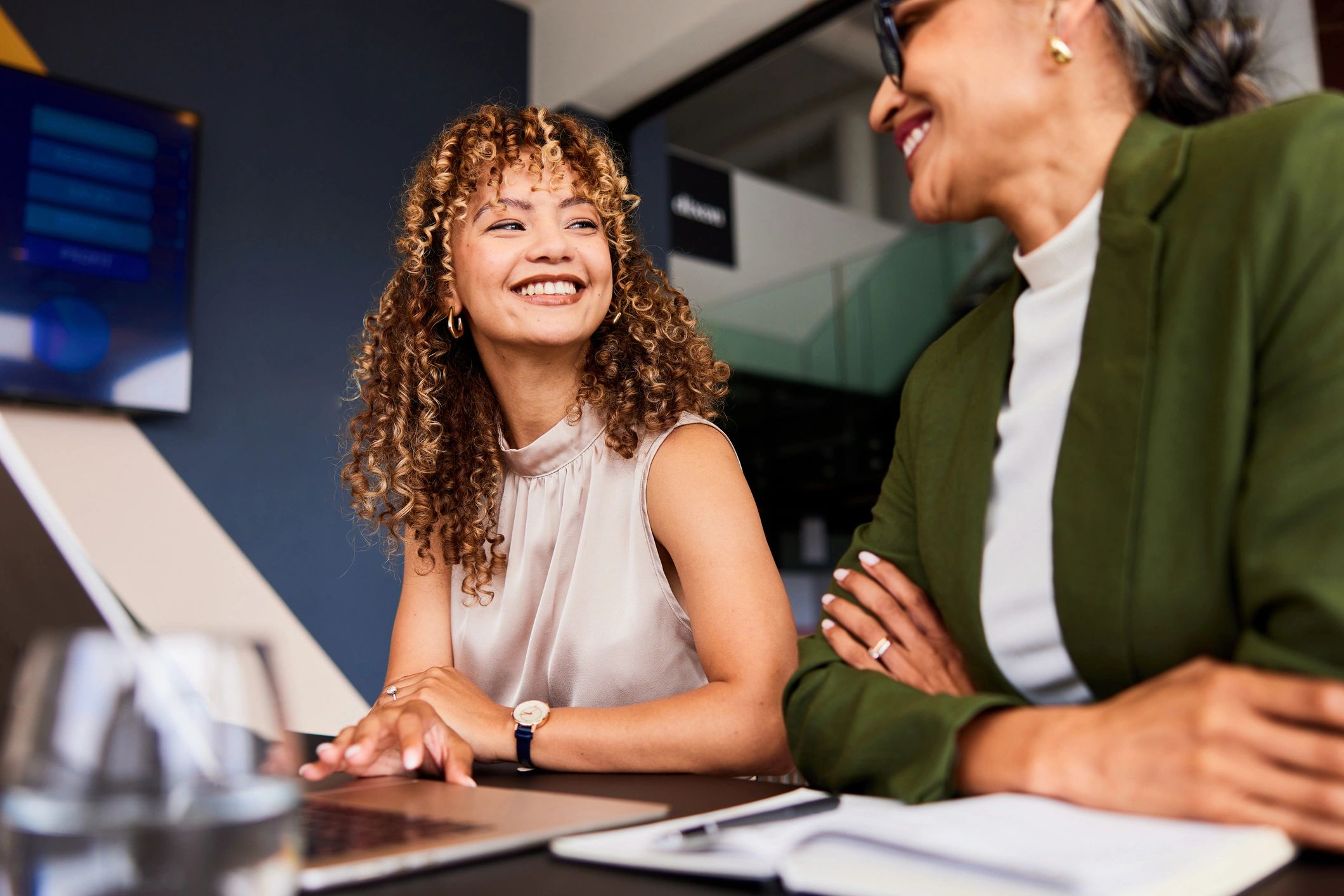 Executive coaching conversation in a professional setting