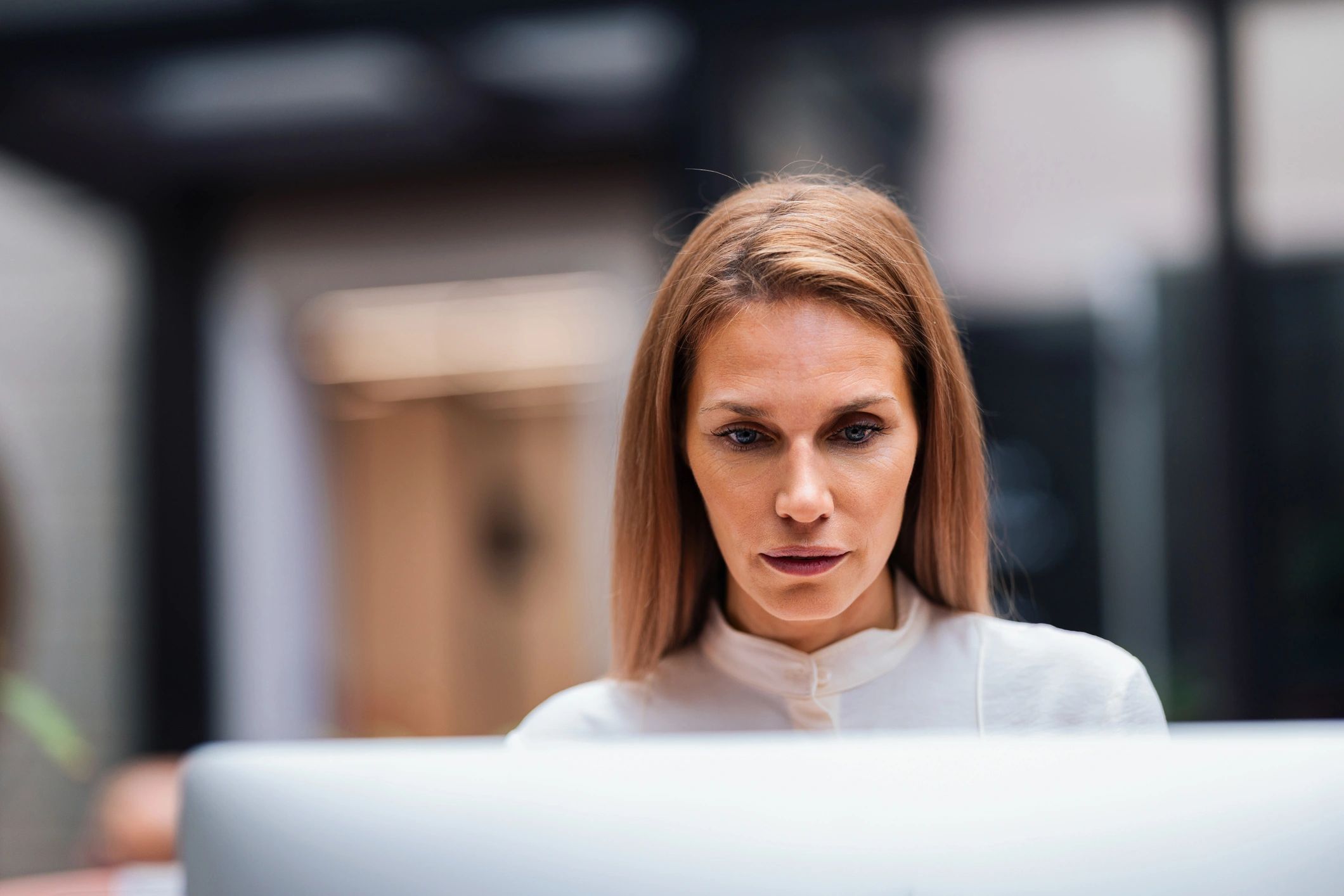 Professional working with focus in a modern office
