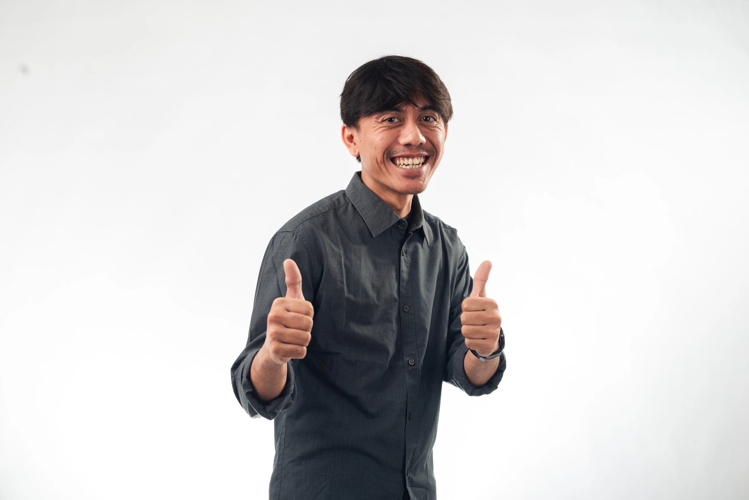 Portrait of a professional man on a plain background